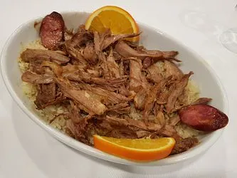 Pato corado com arroz
